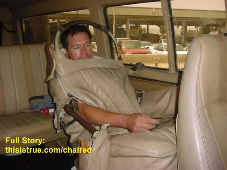 Another view where the seat cover in the back of a van has been open up to reveal a man IS the seat.