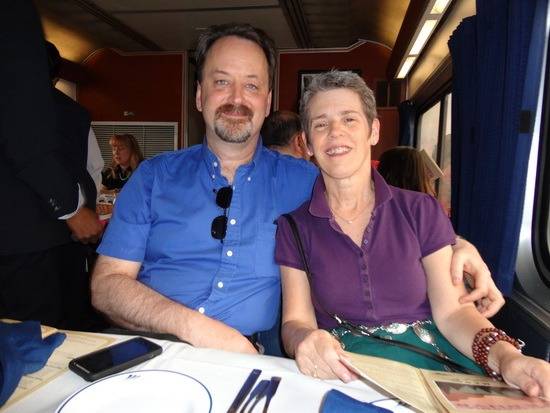 My wife and I relax at dinner in the dining car. Randy and wife in dining car