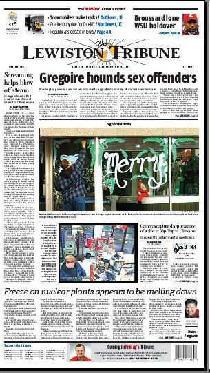 Front page of the Lewiston Tribune newspaper featuring headlines, images of people painting a holiday scene with merry on a window, and articles about sex offenders, nuclear plants, and local news.