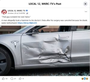 Screenshot of a Facebook post from WKRC Cincinnati features a photo of a side view of a silver Tesla with a large, deep dent in the driver’s side door and shattered glass on the ground.