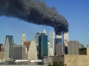 The Twin Towers on fire after being struck by airliners on 9/11.