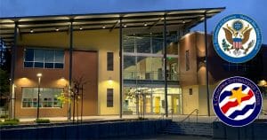 Beautifully lit school building at dusk.